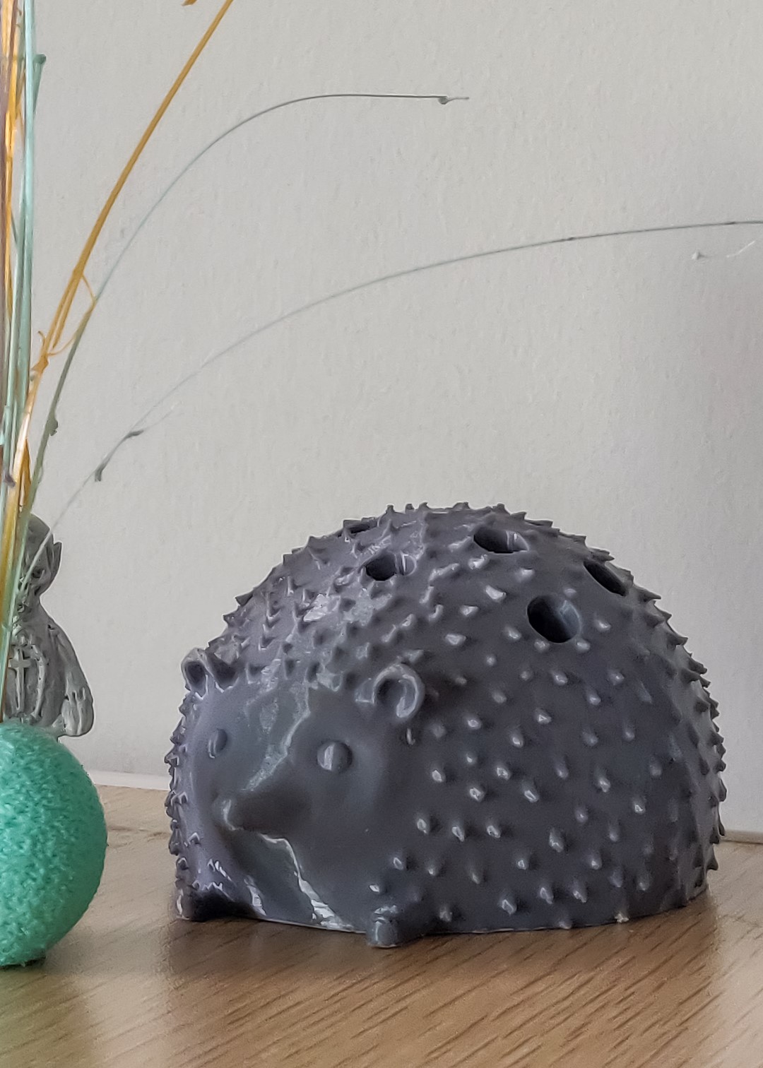 This hedgehog was fully sculpted from a sphere in MeshMixer before I took it into Fusion to attempt making it look like an old wooden toy where if you lift the handle the quills would come out the holes you see here.